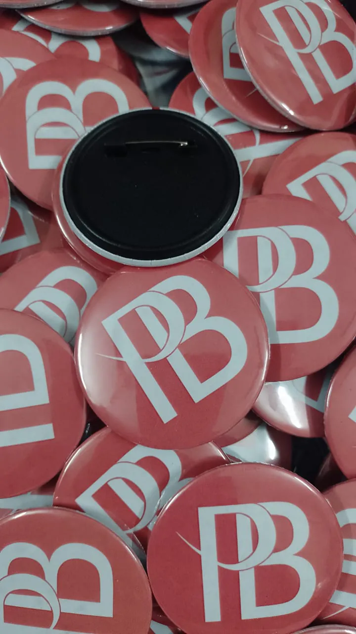 Custom button badges manufactured by Sidamhk